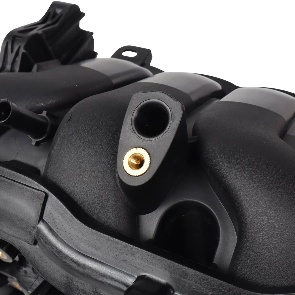 Air intake manifold close-up of curved section with threaded metal insert