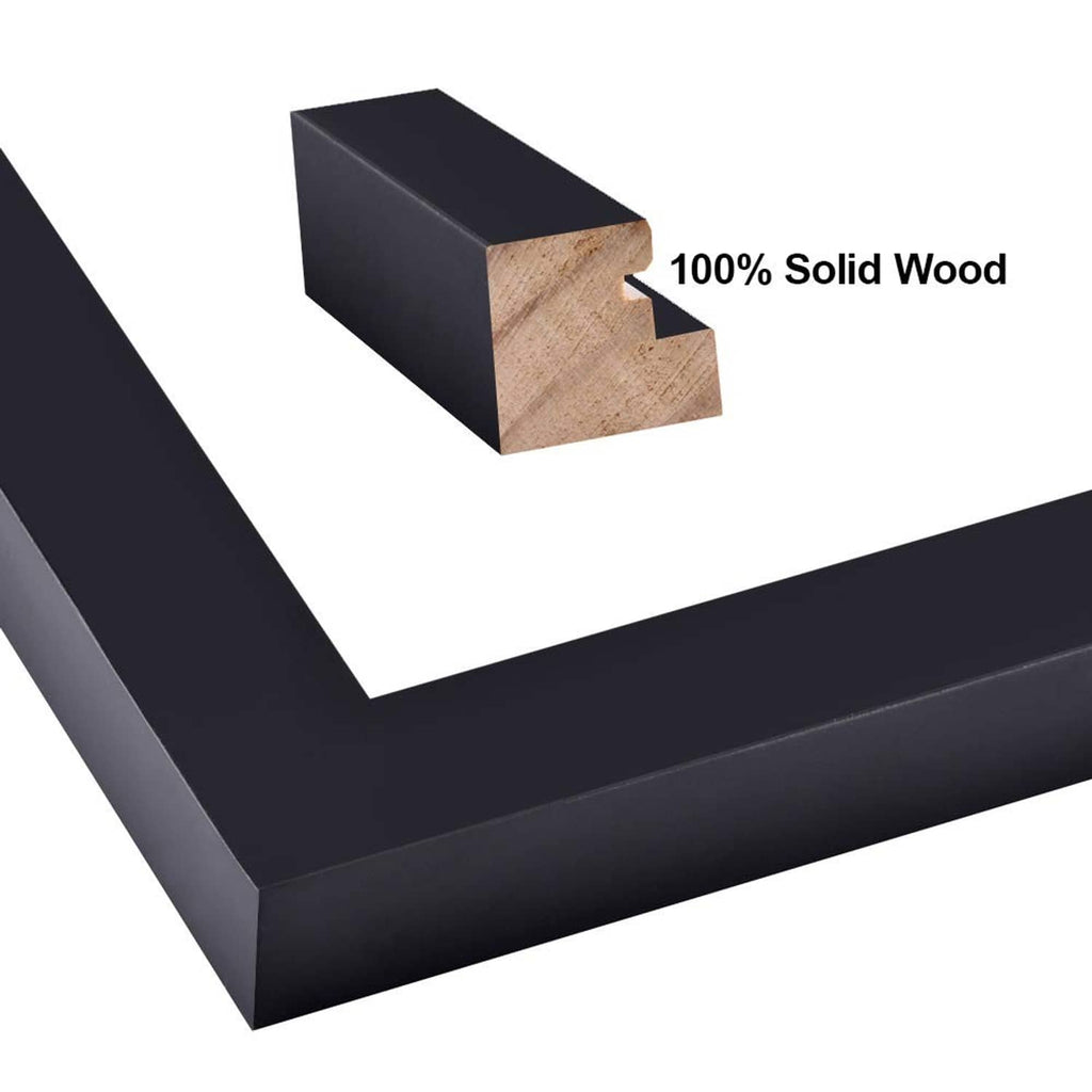 Black frame corner close-up showing solid wood inner edge and joint