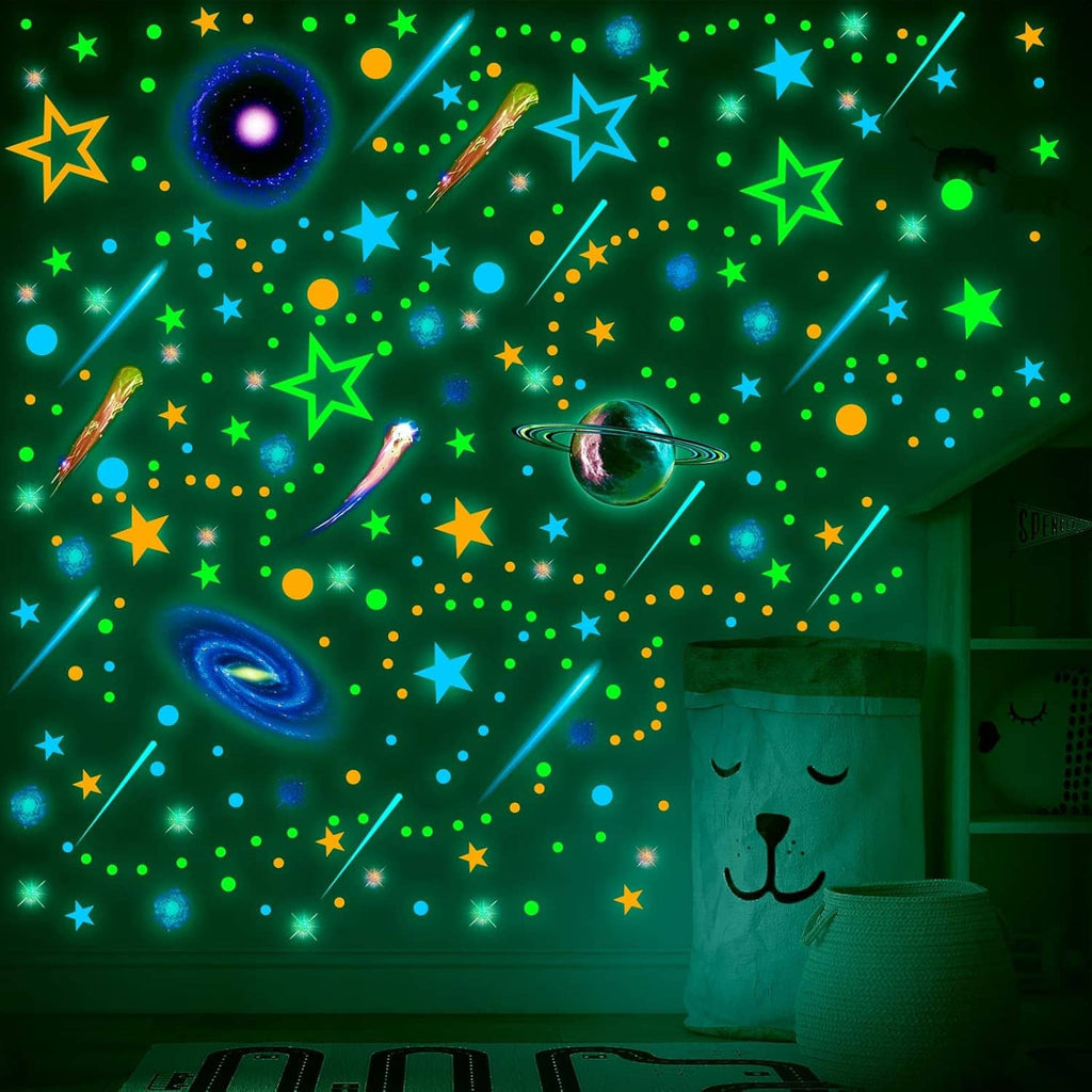 Glow-in-the-dark space wall decals with green, blue, and purple stars and planets