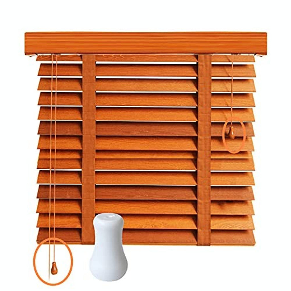 White plastic blind cord tassel knob with pull cord loop on a window blind