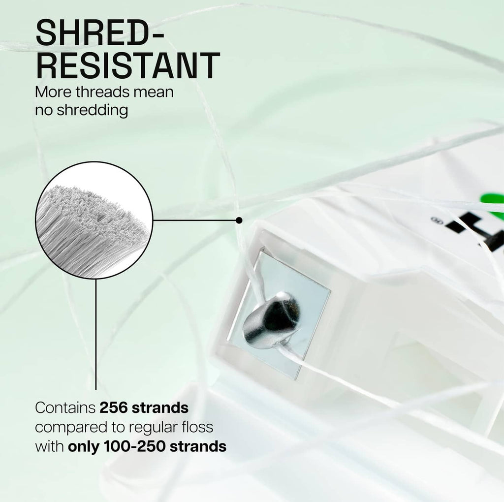 Shred-resistant waxed dental floss with close-up strand detail