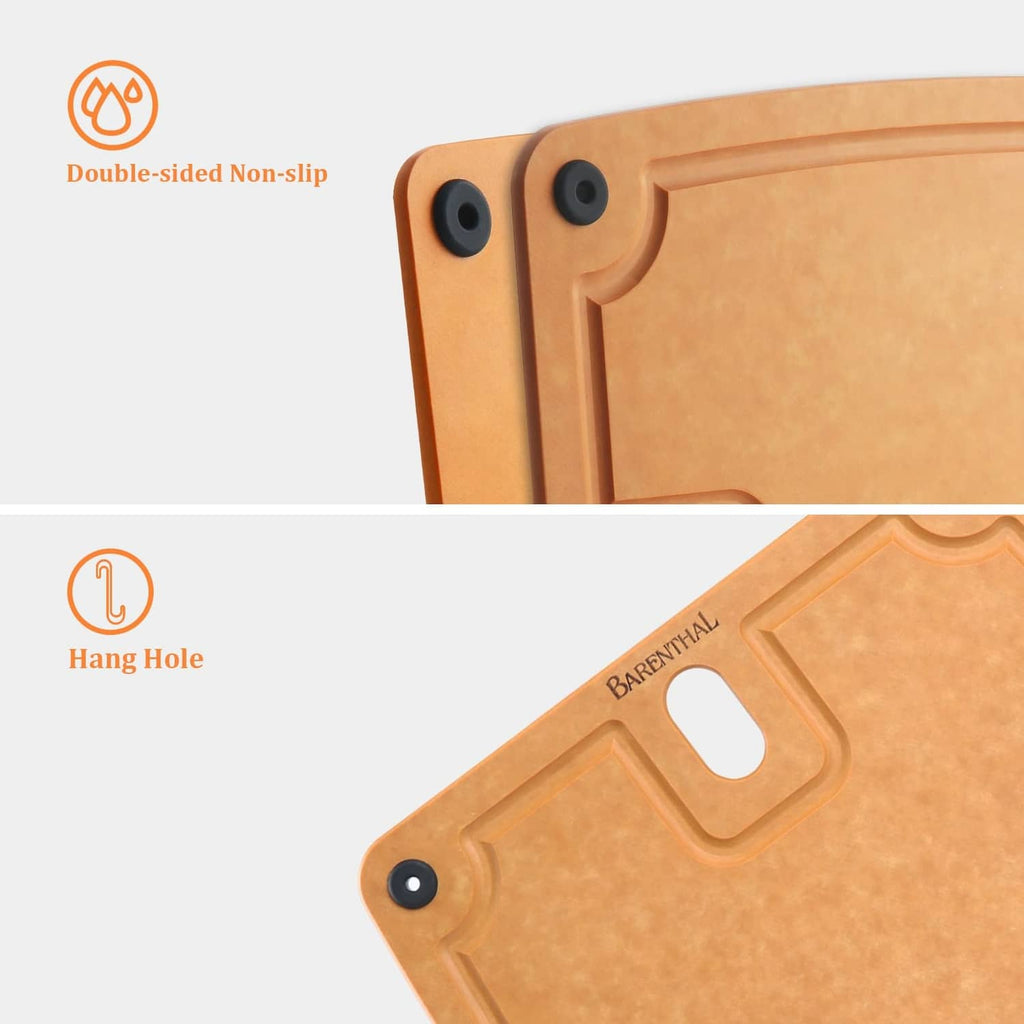 Tan composite cutting board with corner grip feet and a hanging hole at the top