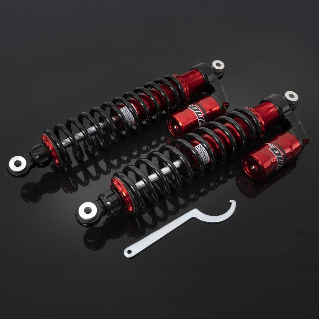 Pair of red adjustable rear air shocks with black coil springs and eyelet mounting brackets