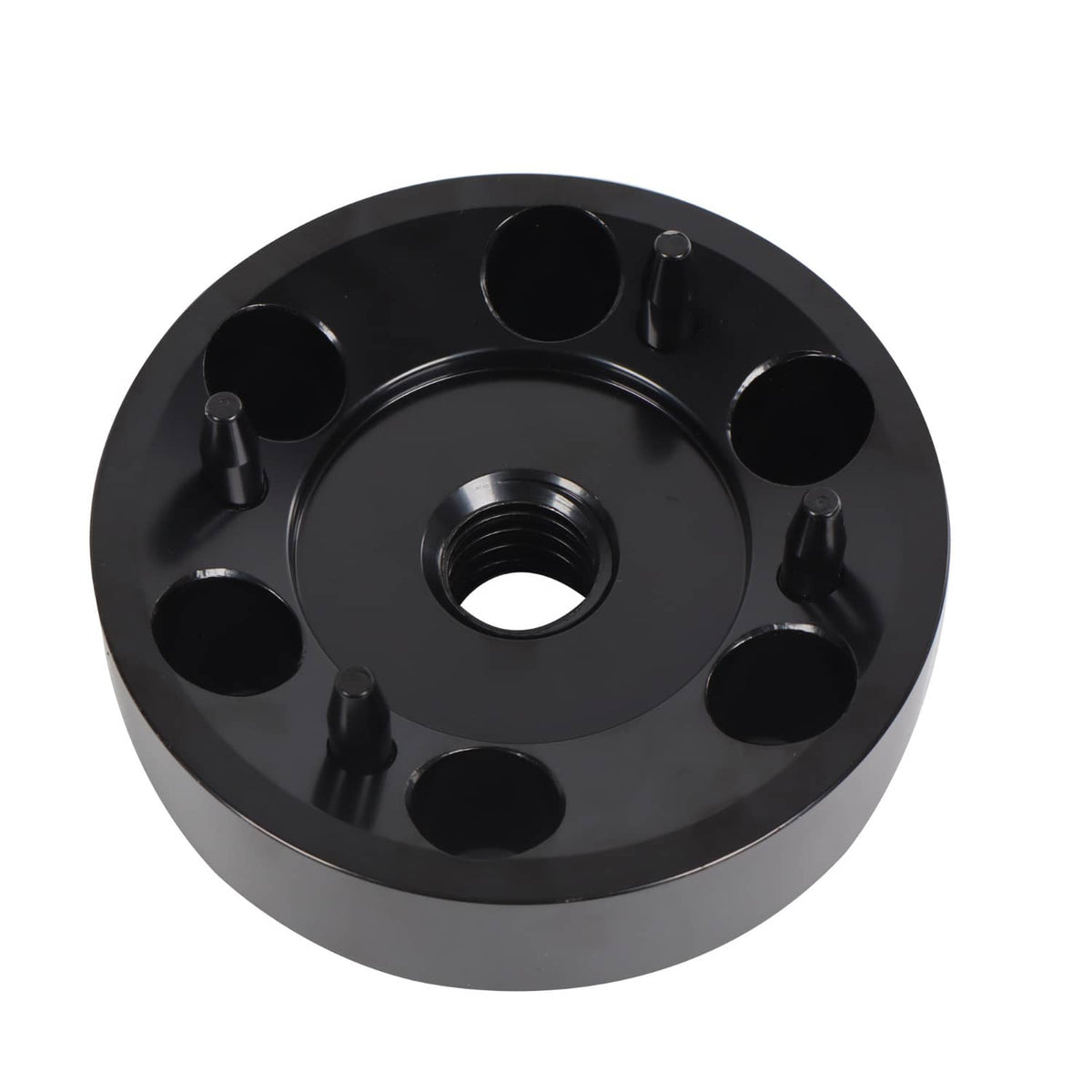 Black bushing installation tool plate with central threaded hole and mounting pins