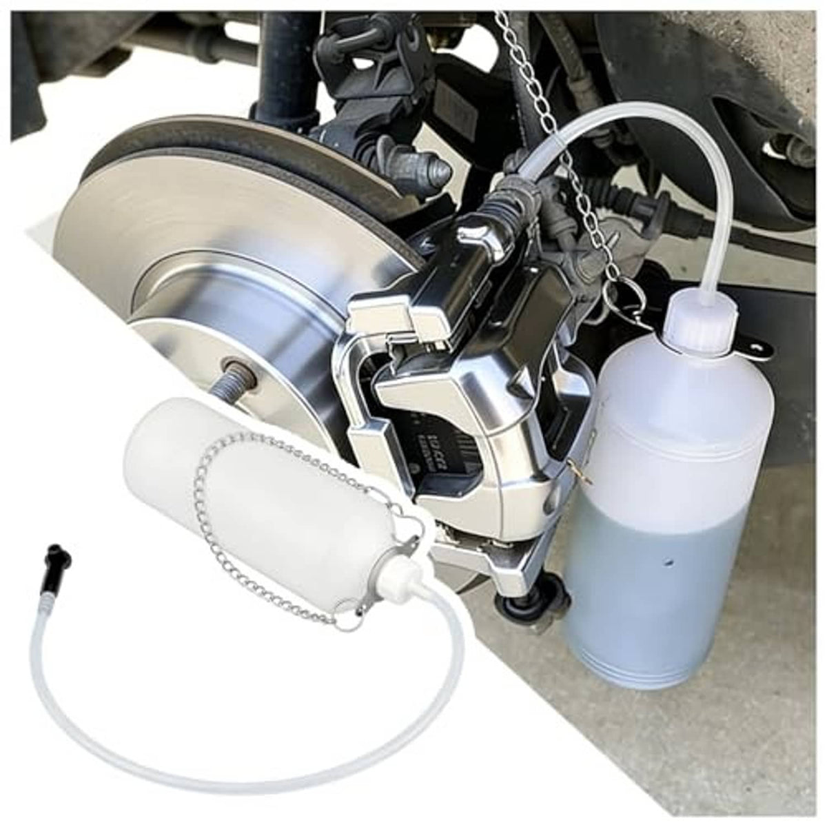 Hangable brake bleeder bottle kit with white bottle, clear hose, and hanging chain