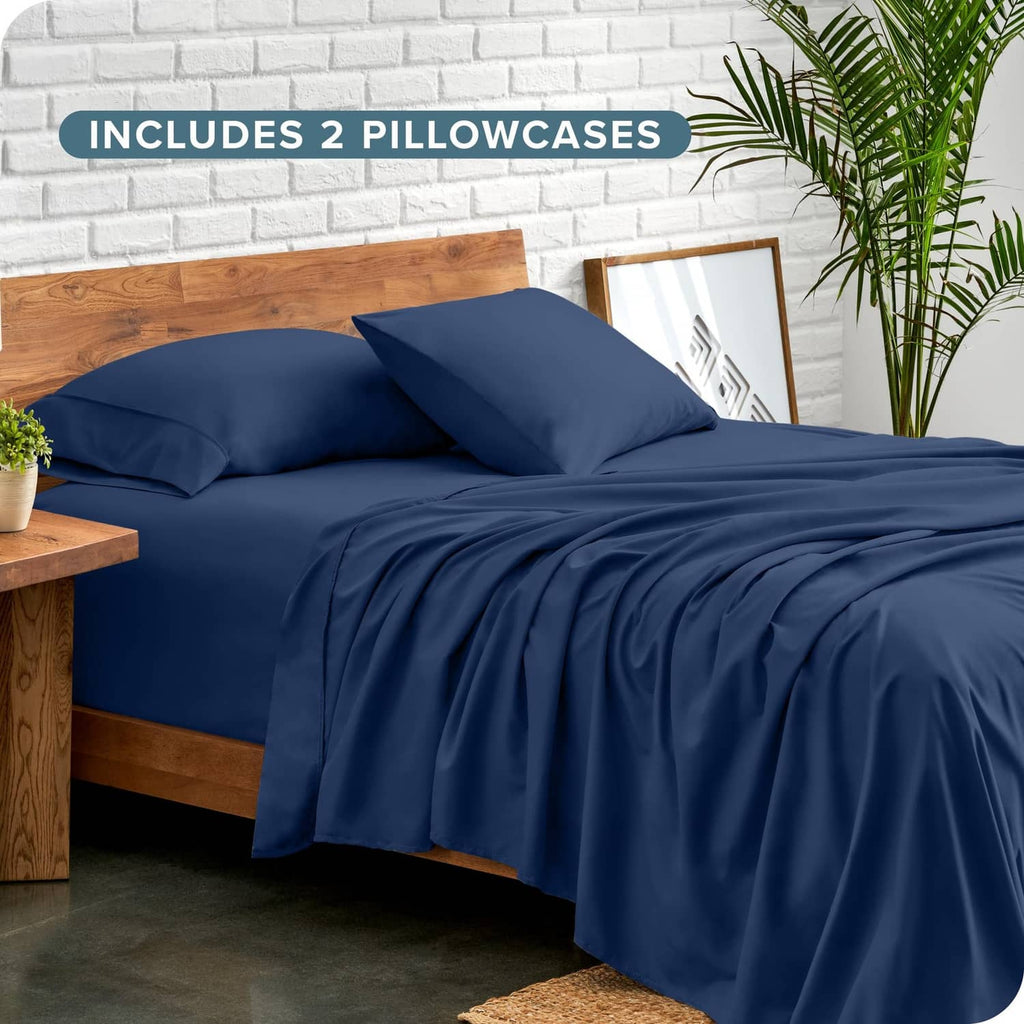 Dark blue twin XL sheet set with two pillowcases and matching flat and fitted sheets