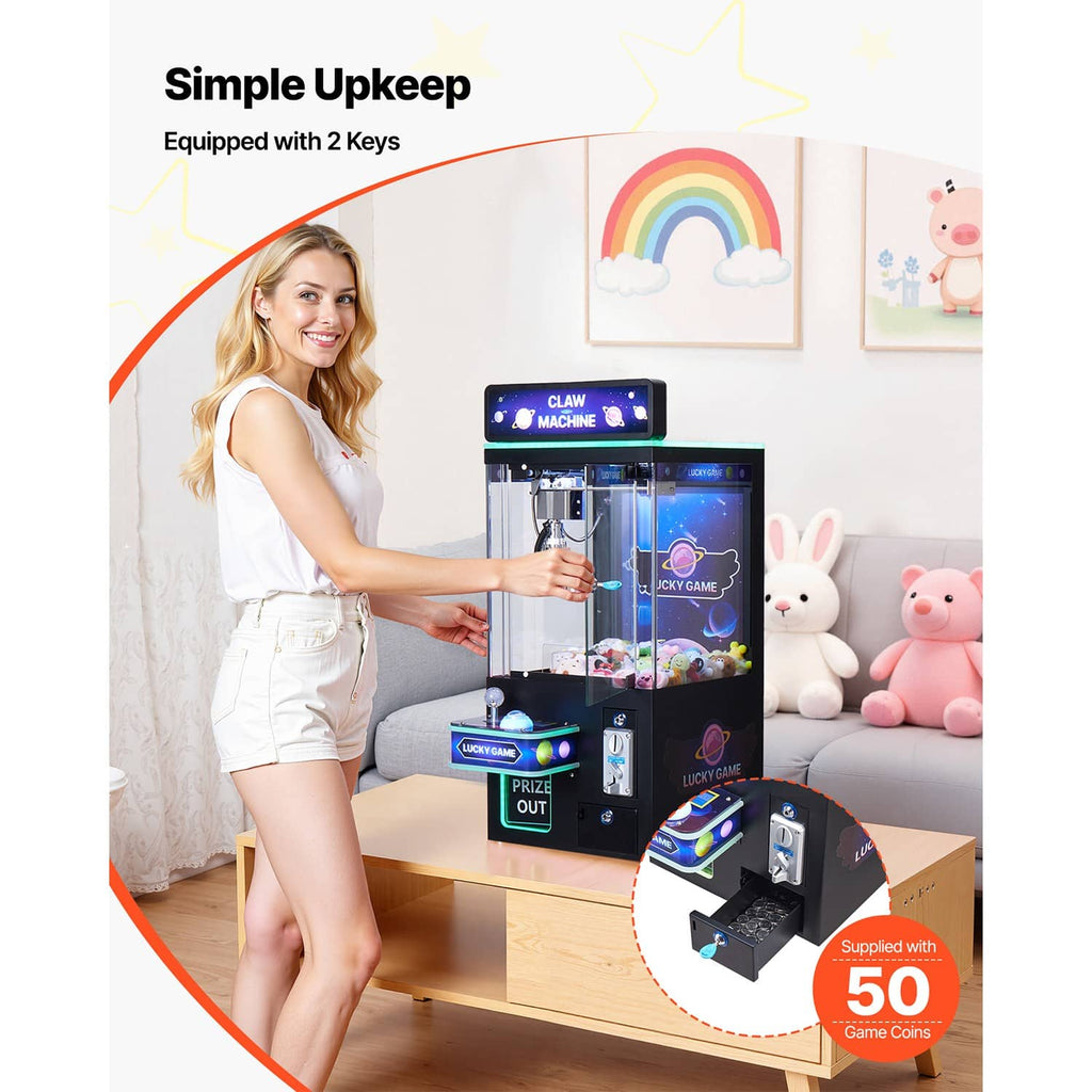Claw crane arcade game with clear prize chamber and two-key control panel