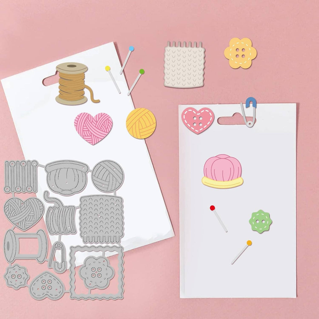 Sewing-themed metal die cuts on cards: thread, heart, yarn balls, needles, tools