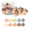 Colorful mini flower claw hair clips set, assorted pastel and neutral colors in clear jar