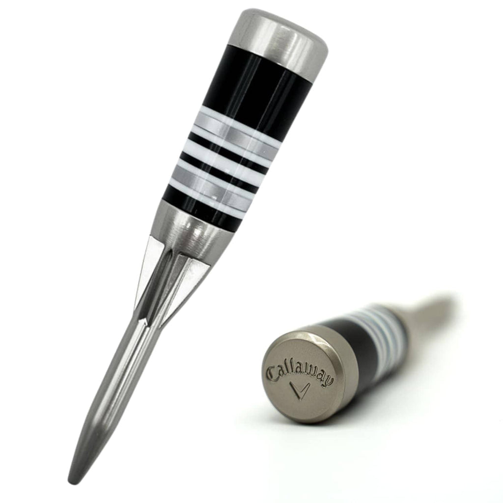 Silver golf divot tool with conical metal tip, black grip rings, and Callaway logo