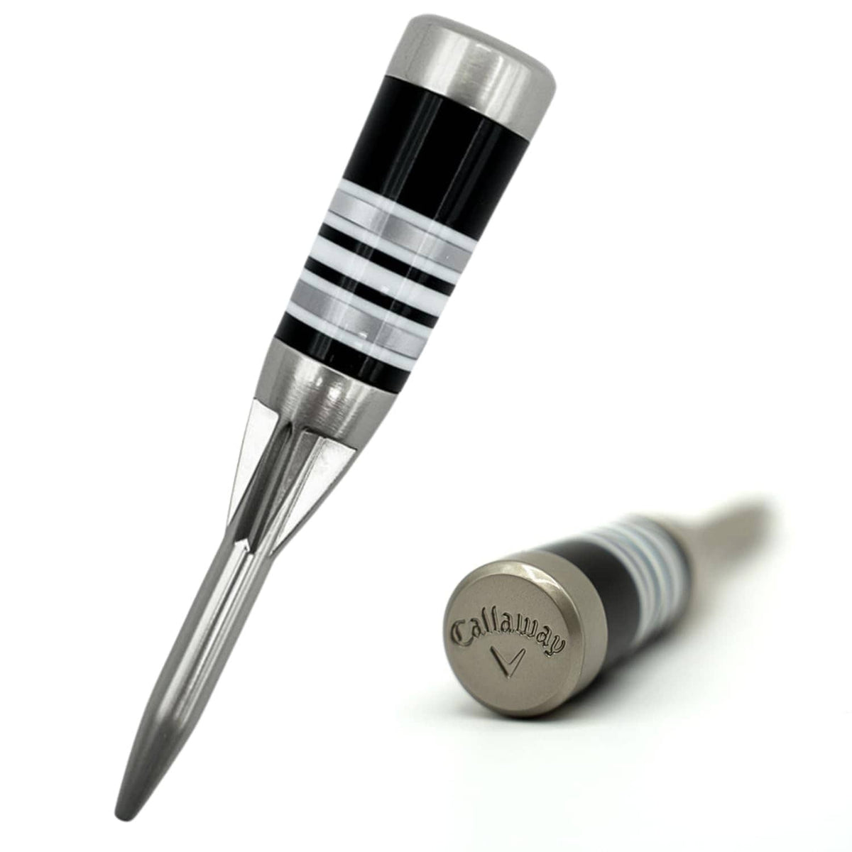 Silver golf divot tool with conical metal tip, black grip rings, and Callaway logo