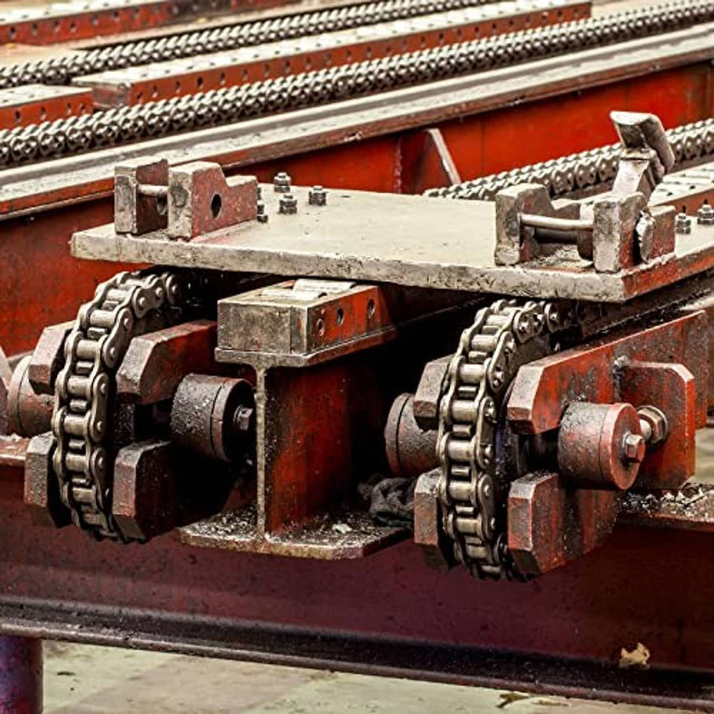 Roller chain sprockets and links on an industrial rail-side drive mechanism