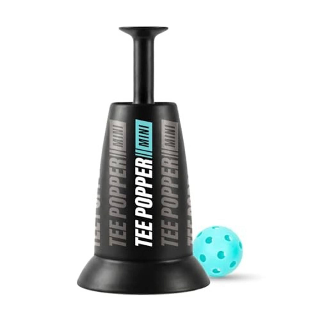 Black mini tee popper training device with teal popper ball next to it