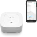 YoLink water leak detector with white top and gray base, front contact pads