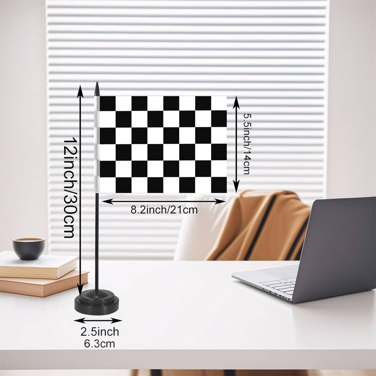Black-and-white checkered racing flag on a tall pole with round base