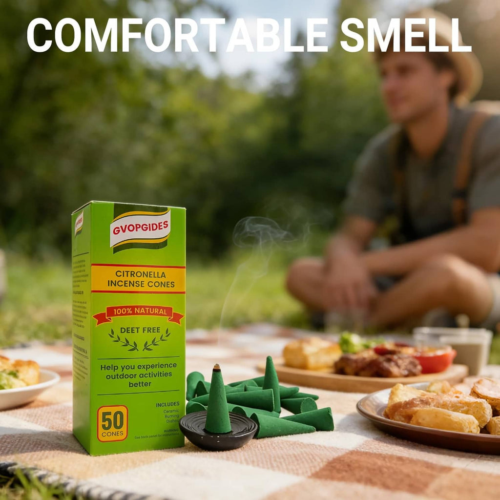 Citronella incense cones with green cone incense and black dish on an outdoor table
