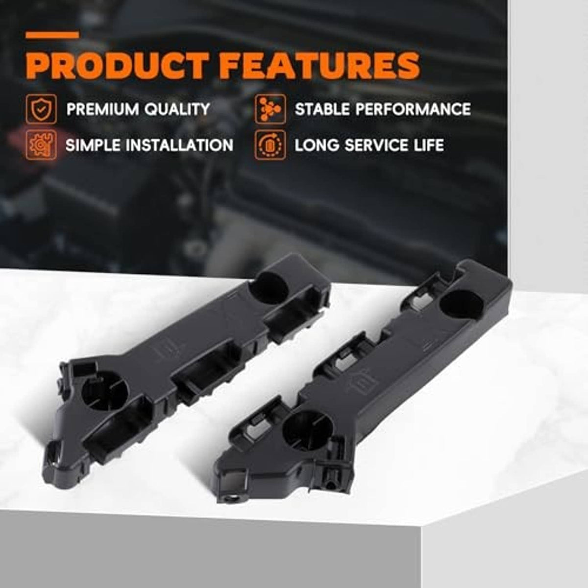 Two black front bumper cover support brackets with circular mounting holes