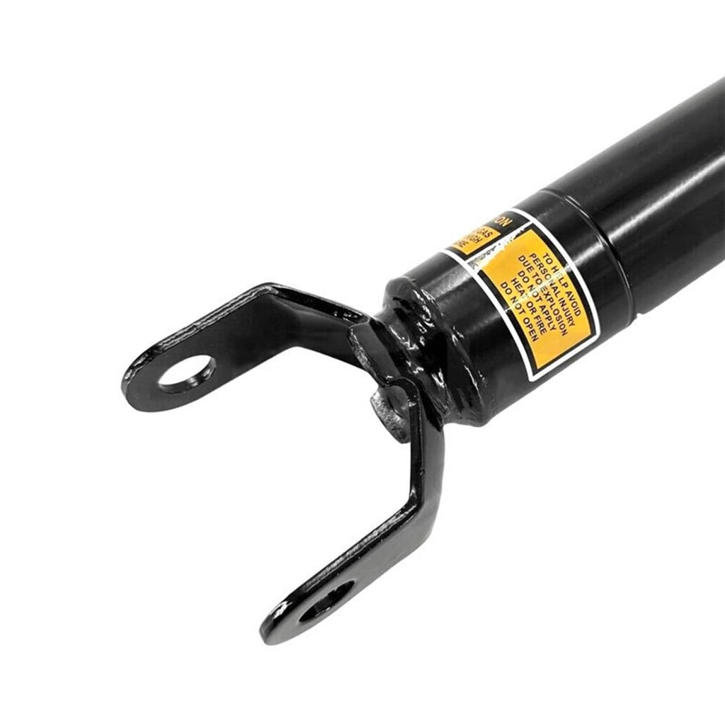 Magnetic shock absorber with black bracket mount and yellow label on black cylinder