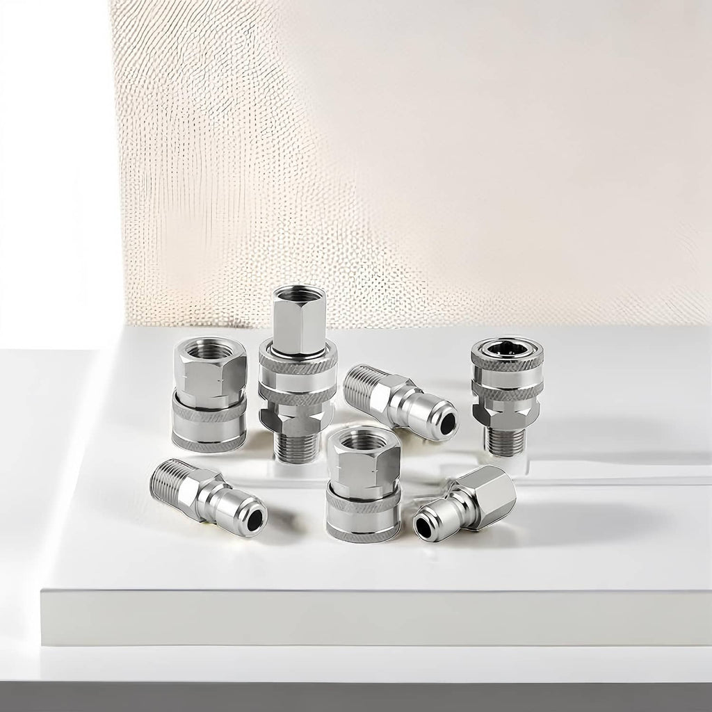 Assorted silver pressure washer quick-connect fittings with threaded connector ends