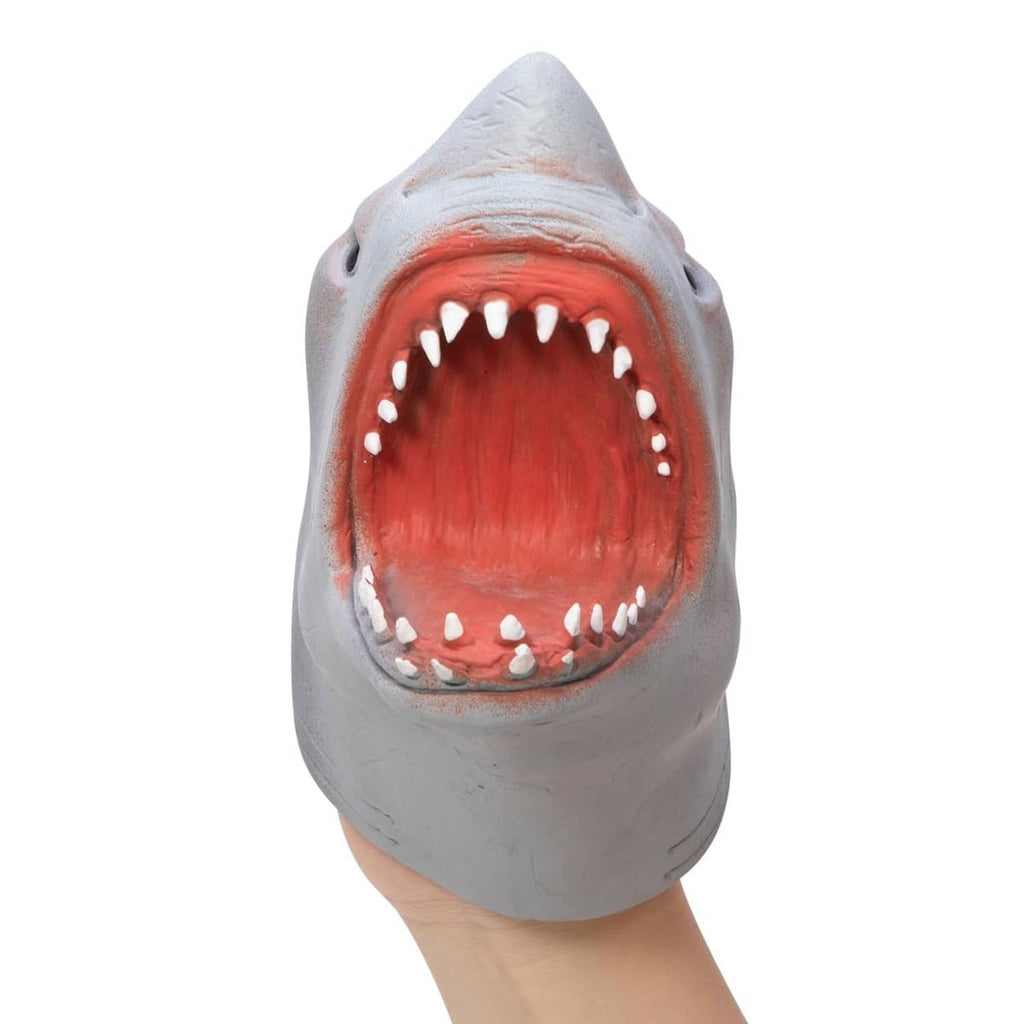 Shark hand puppet with red mouth interior and white teeth, held on hand