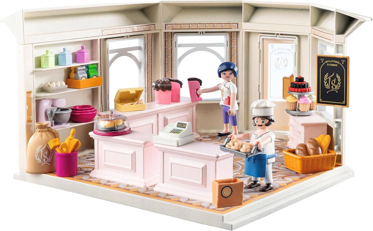 French bakery playset with open counter, shelves, accessories, and two chef figures
