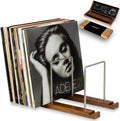 Walnut vinyl record storage stand with two metal side supports and upright album display