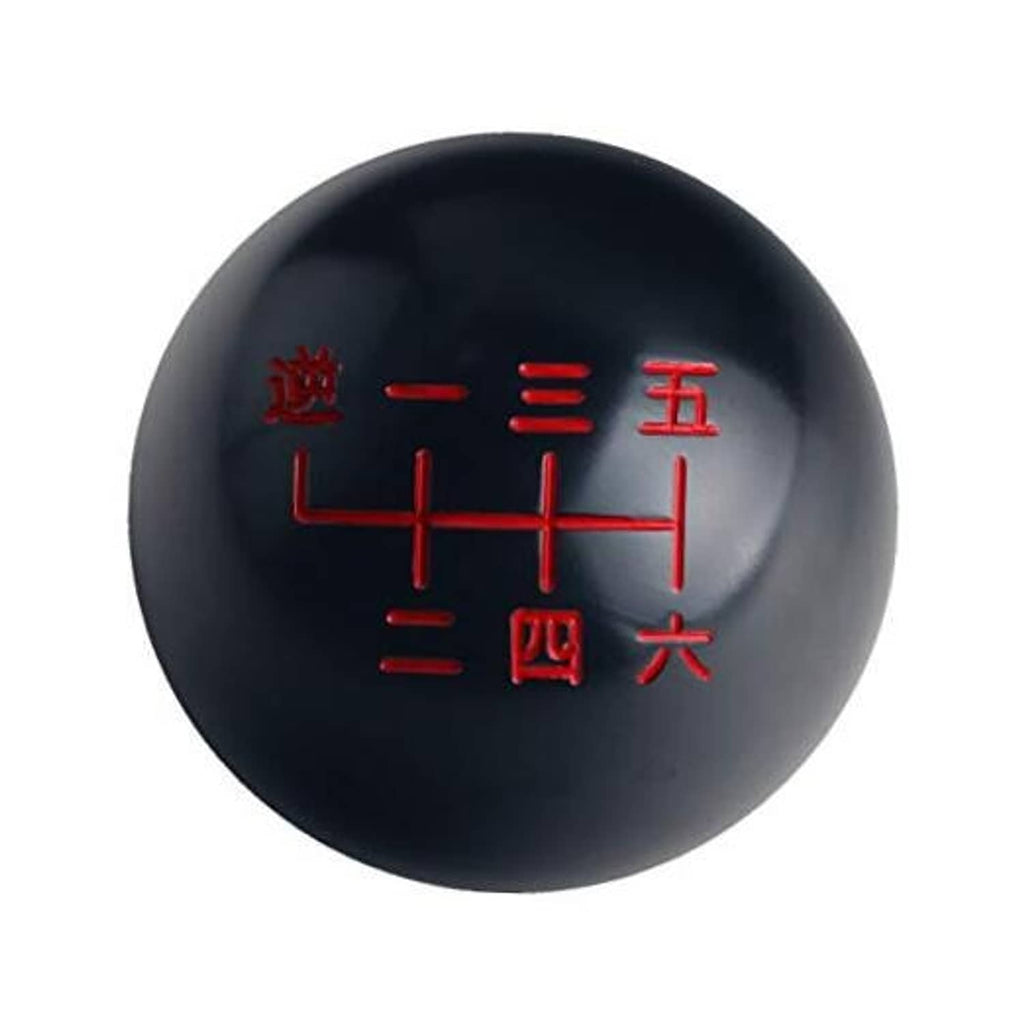 Black 6-speed shift knob with red Japanese number shift pattern on front.