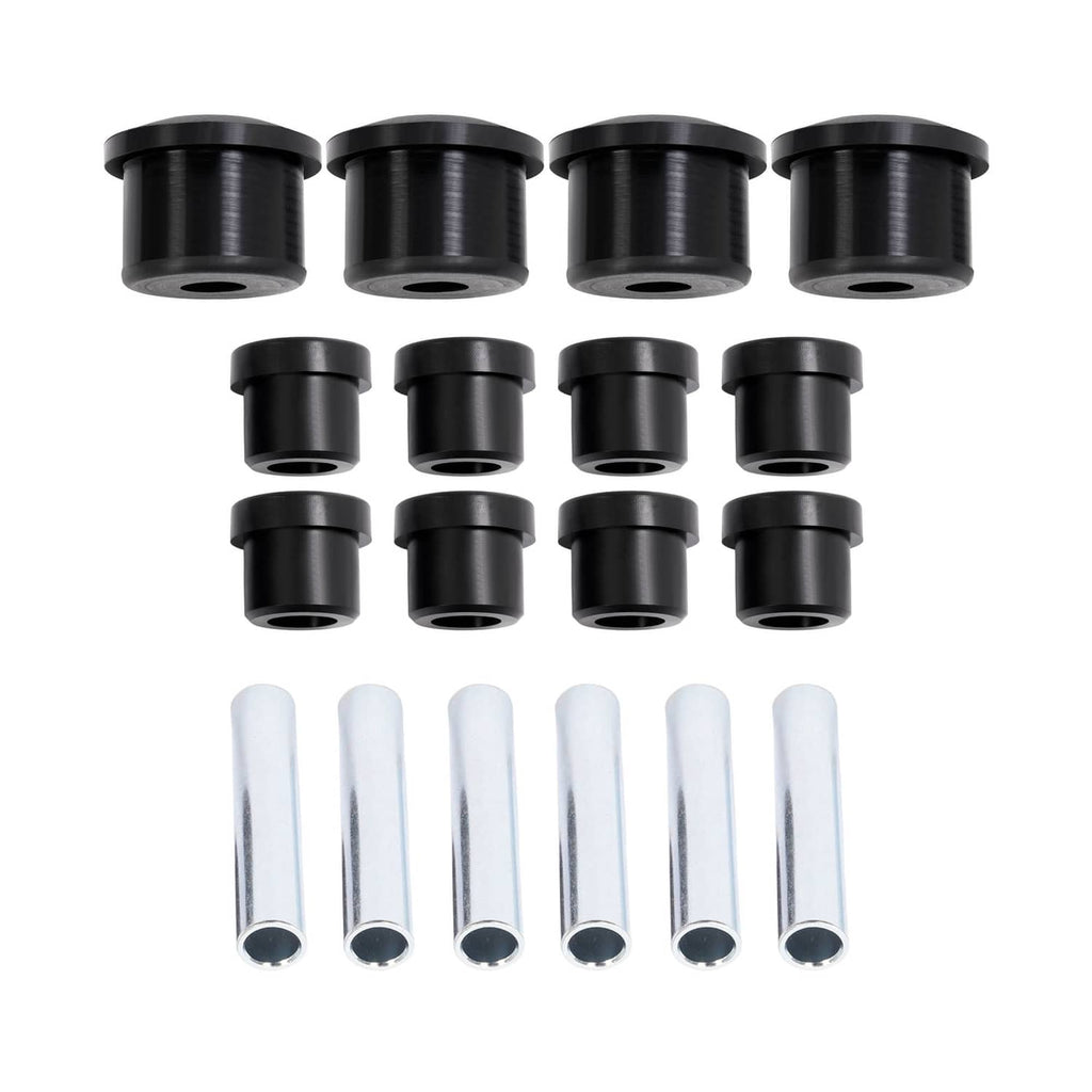 Close-up of black leaf spring bushings and silver steel sleeves included in the kit