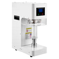 White automatic can sealer with glass cover, sealing rollers, and warning label panel.
