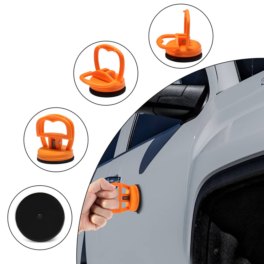 Orange suction cup dent puller held to a car panel, showing tool handle and base