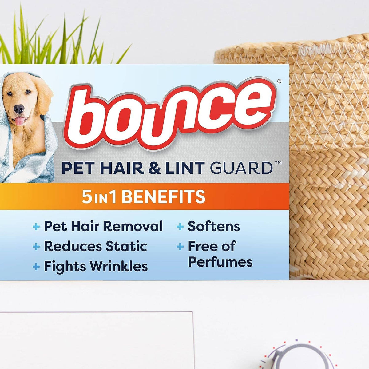 Pet hair & lint guard dryer sheet box with 5-in-1 benefits and unscented claim