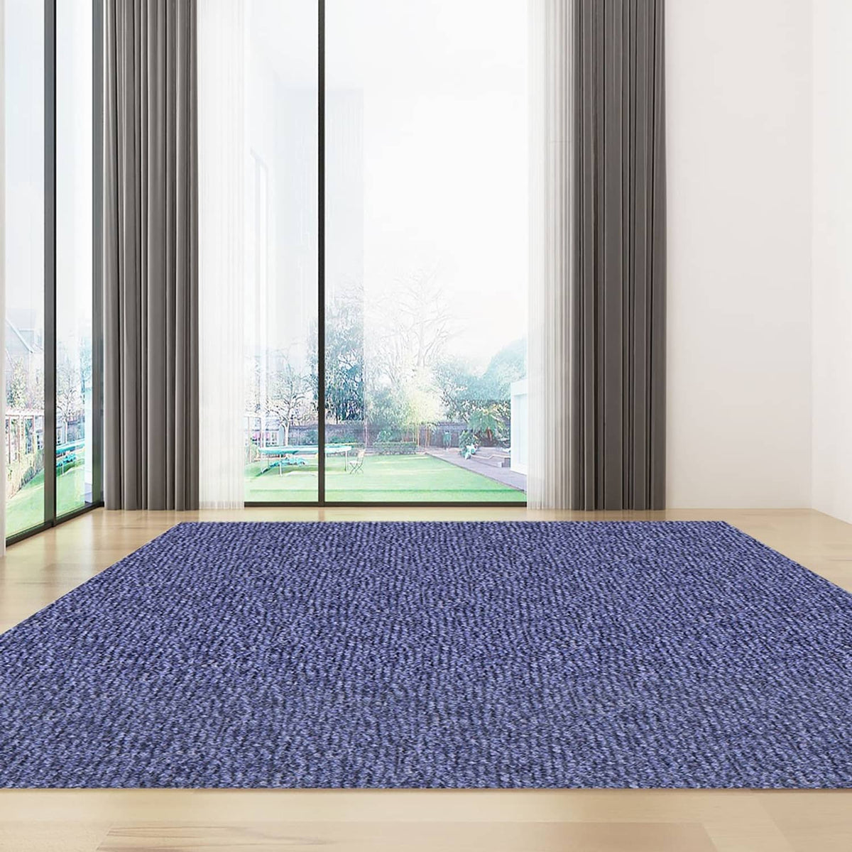 Indoor/outdoor deck rug, dark blue cutpile rectangular rug on floor