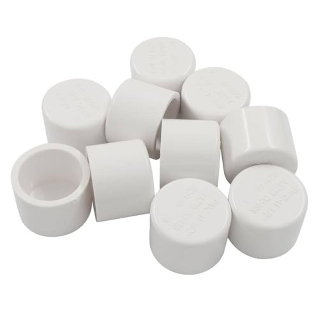 Pack of white PVC pipe end caps, stacked and angled
