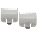 Pair of silver clipper guard attachments with comb teeth and size markings