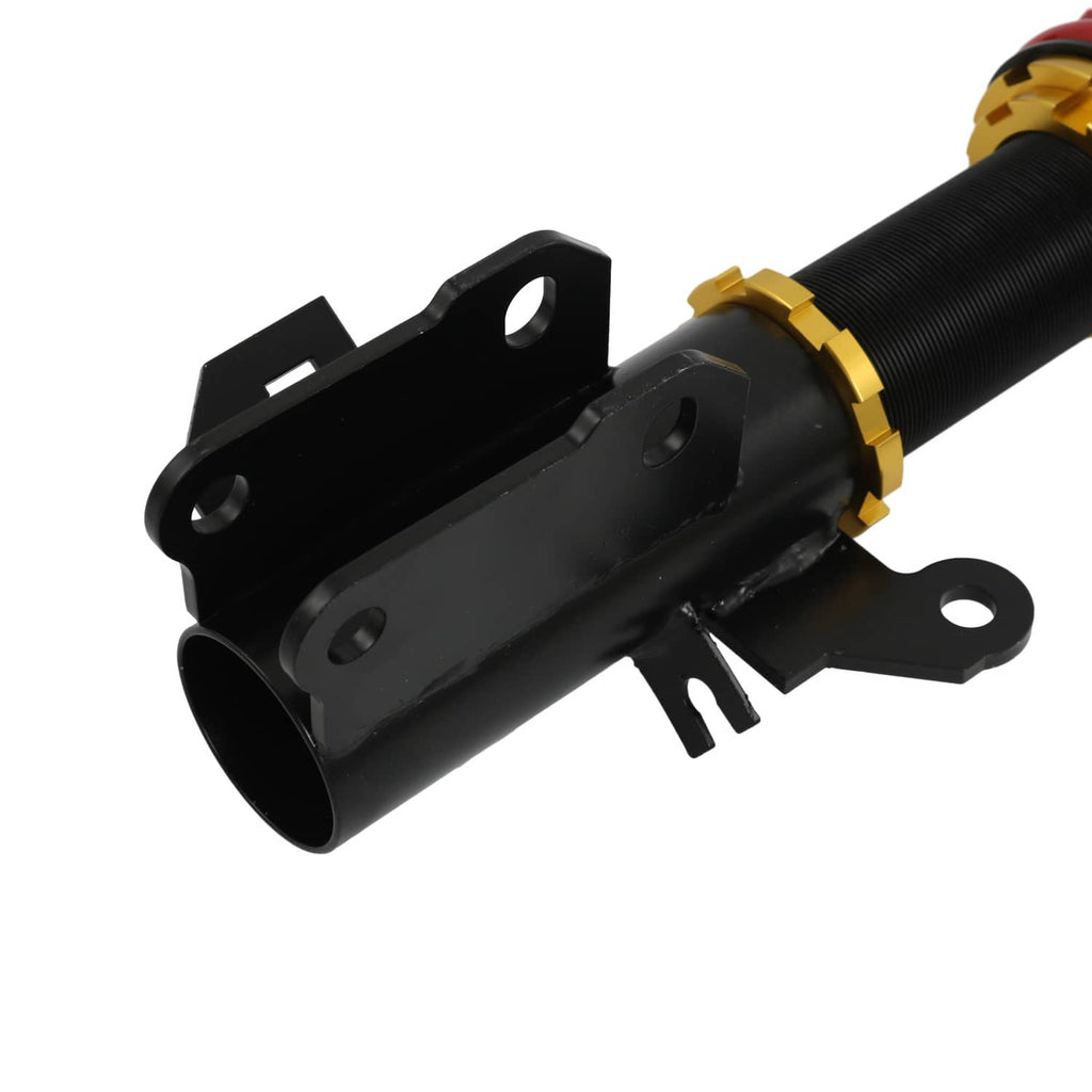 Coilover mounting bracket with black housing and gold ring on shock