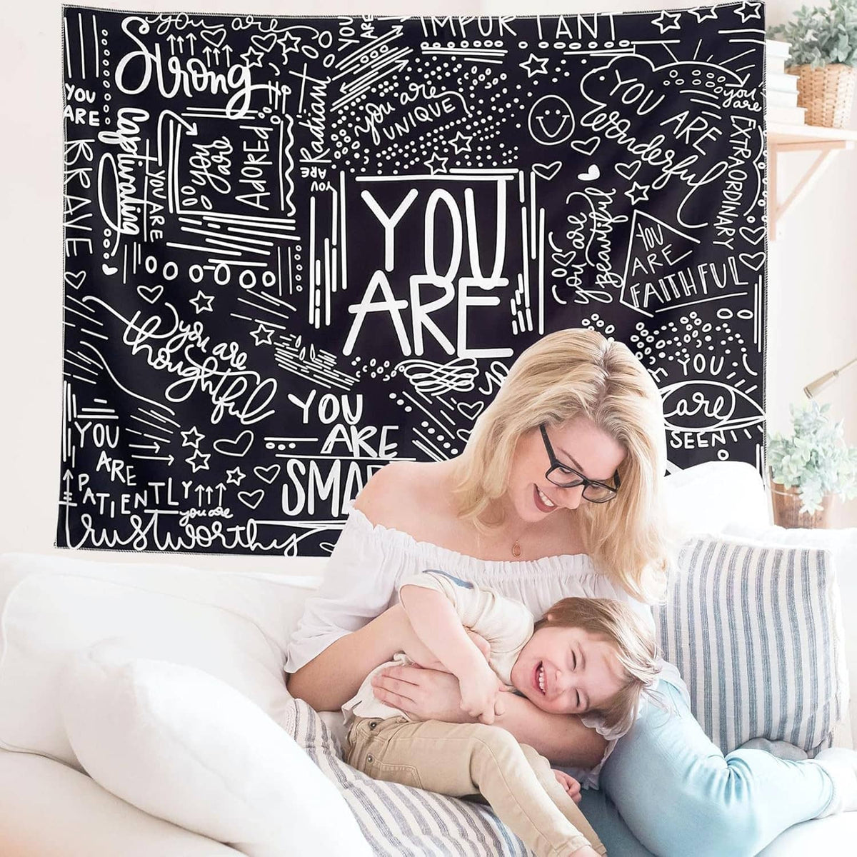 Black and white inspirational wall tapestry with chalk-style script and “YOU ARE”