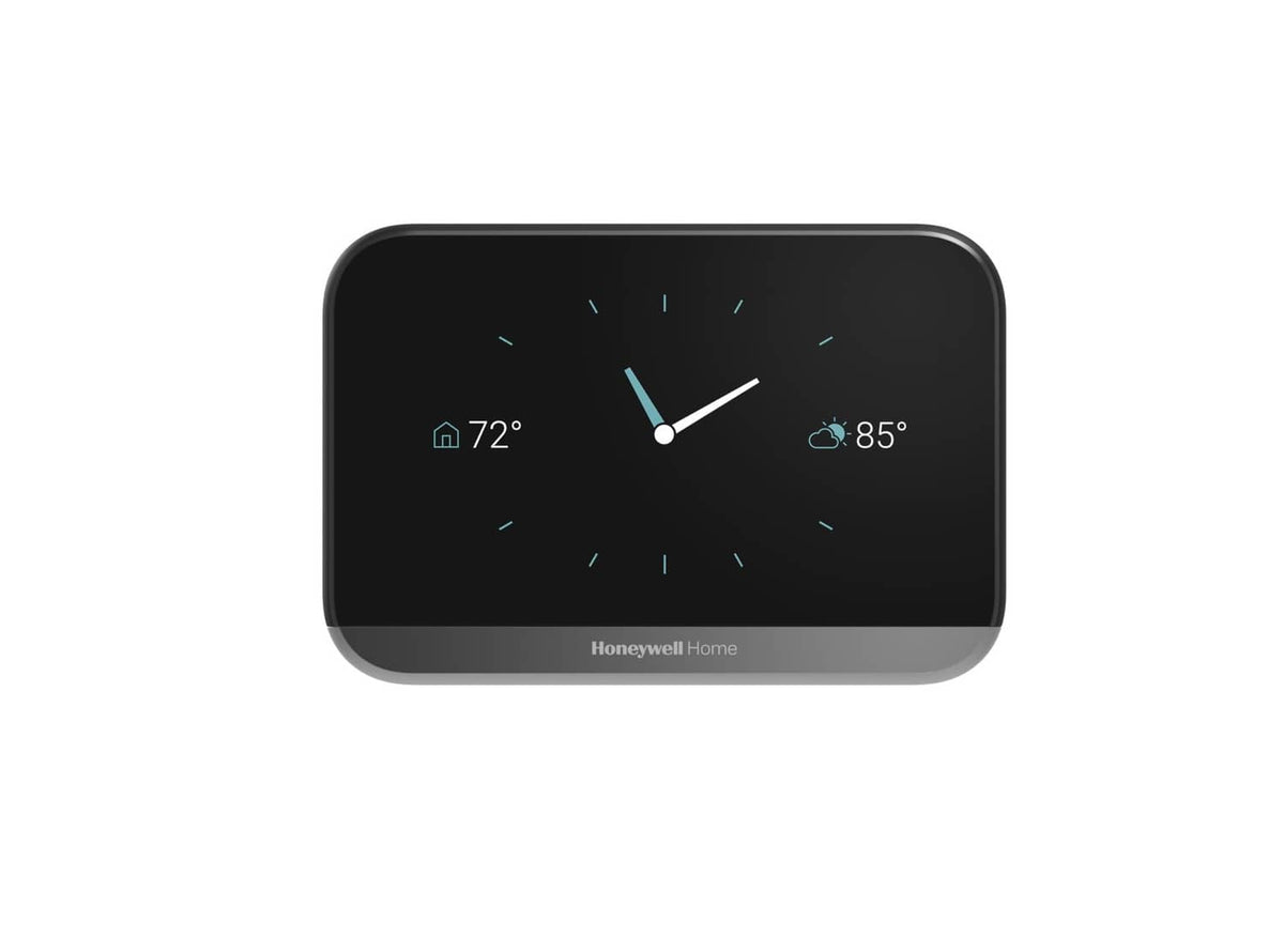 Black smart thermostat with touchscreen showing temperatures and an analog-style clock