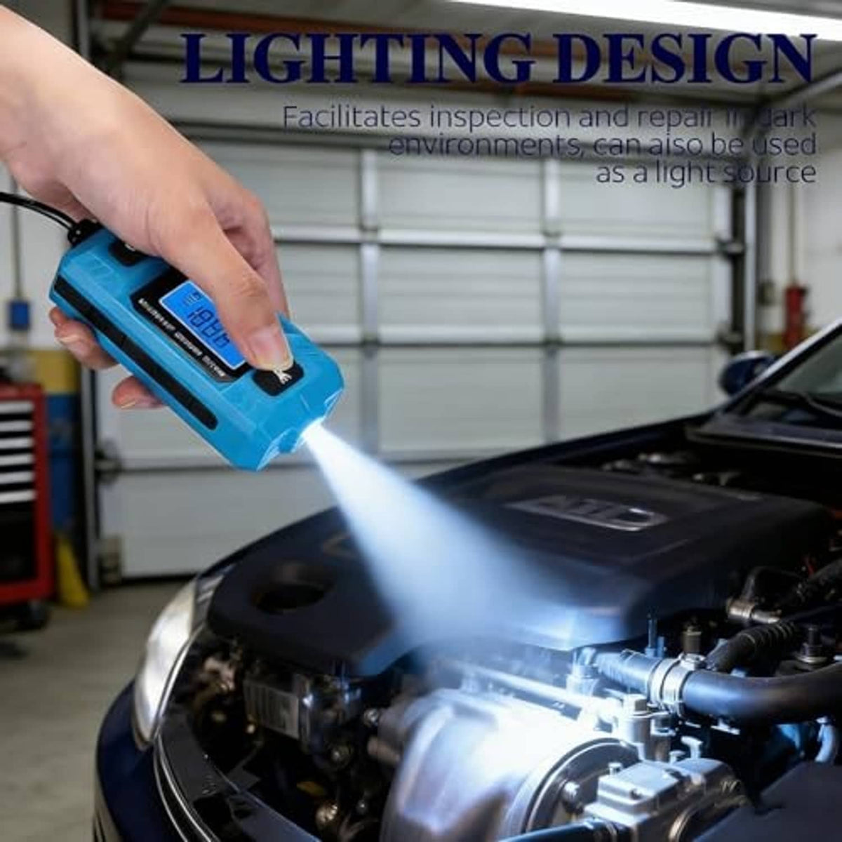 Blue current fault tester being used near engine, LCD visible with probe cable attached