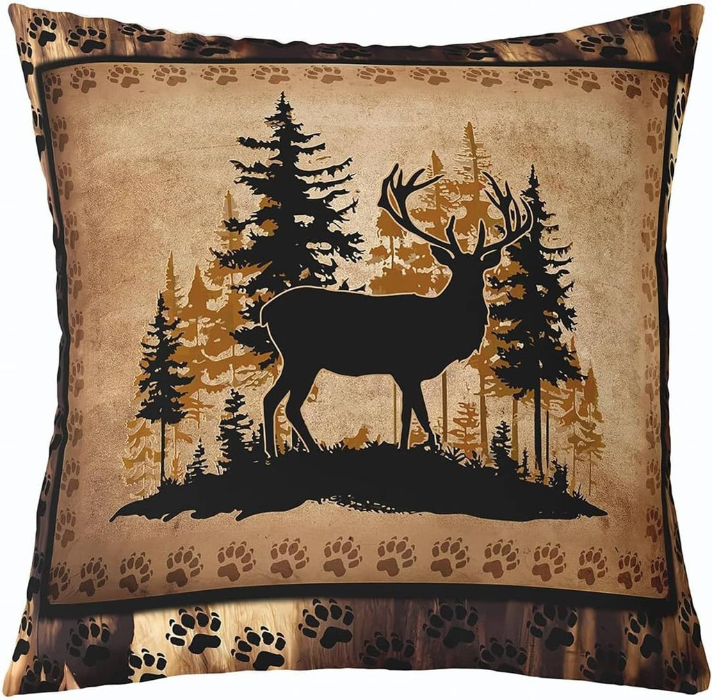 Tan throw pillow cover with black deer in pine trees and paw print border