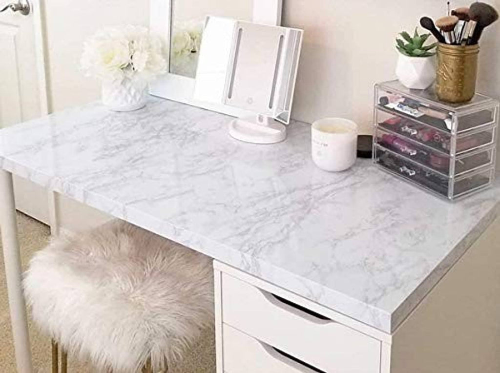 Glossy white marble contact paper applied to a kitchen countertop surface