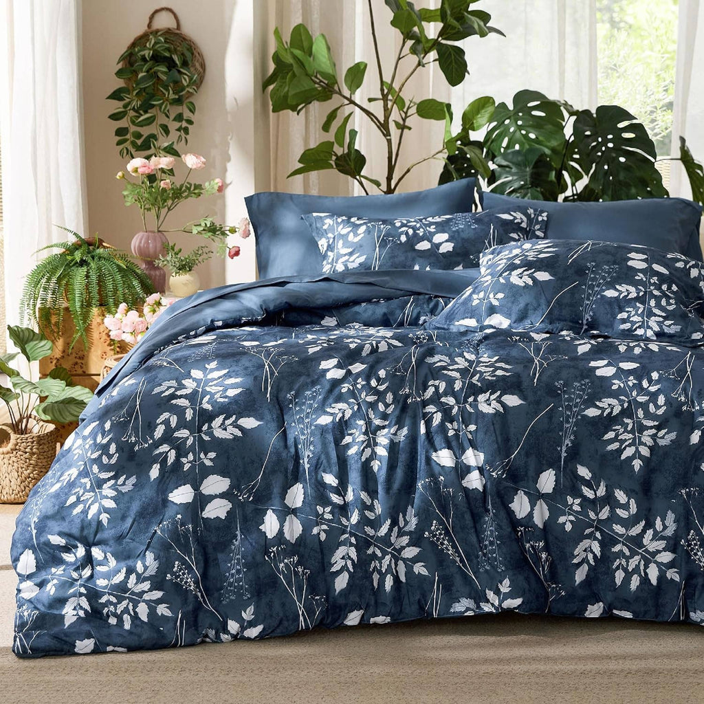 Navy floral quilted comforter set, queen size, with multiple coordinating pillows