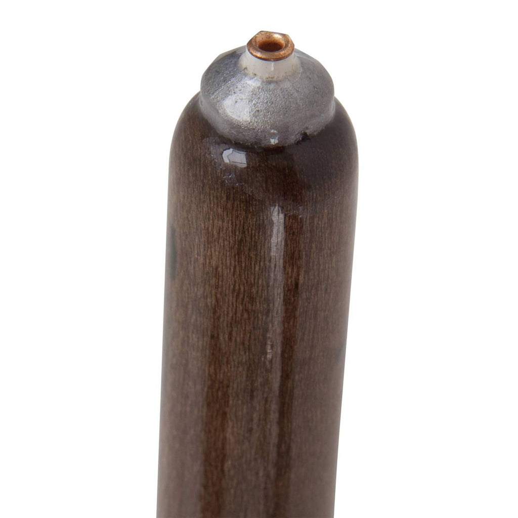 Dark wooden balsa float body with metal top ring, weighted pole float