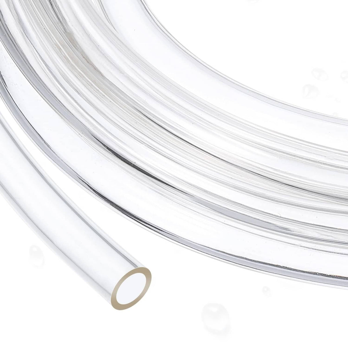 Clear PVC tubing close-up with multiple coils and round hollow openings