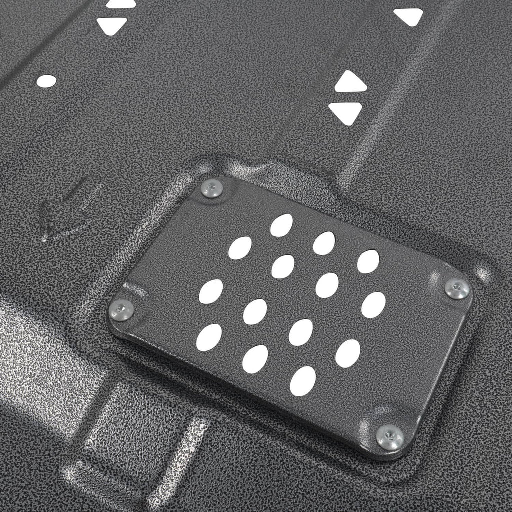 Close-up of black perforated access plate on transmission skid shield