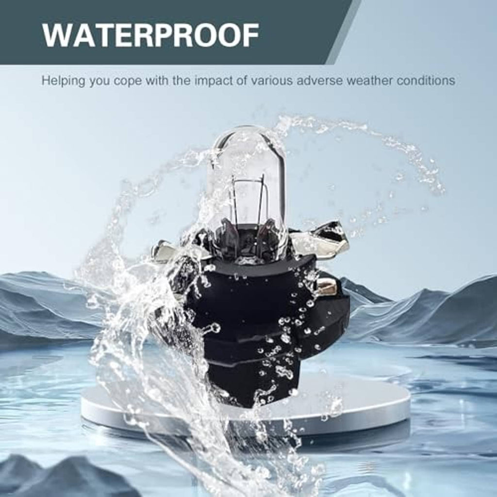 Dashboard light bulb with clear glass lamp and black base, splashing water droplets