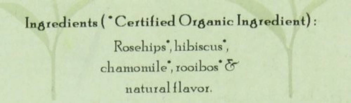 Herbal berry essence tea ingredient text close-up: rosehips, hibiscus, chamomile, rooibos