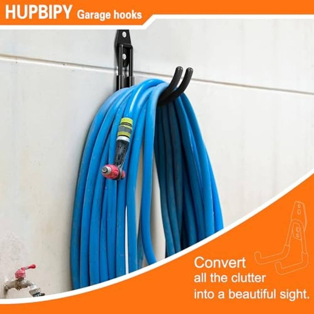 Black garage J hooks holding a bundle of blue garden hoses on a wall