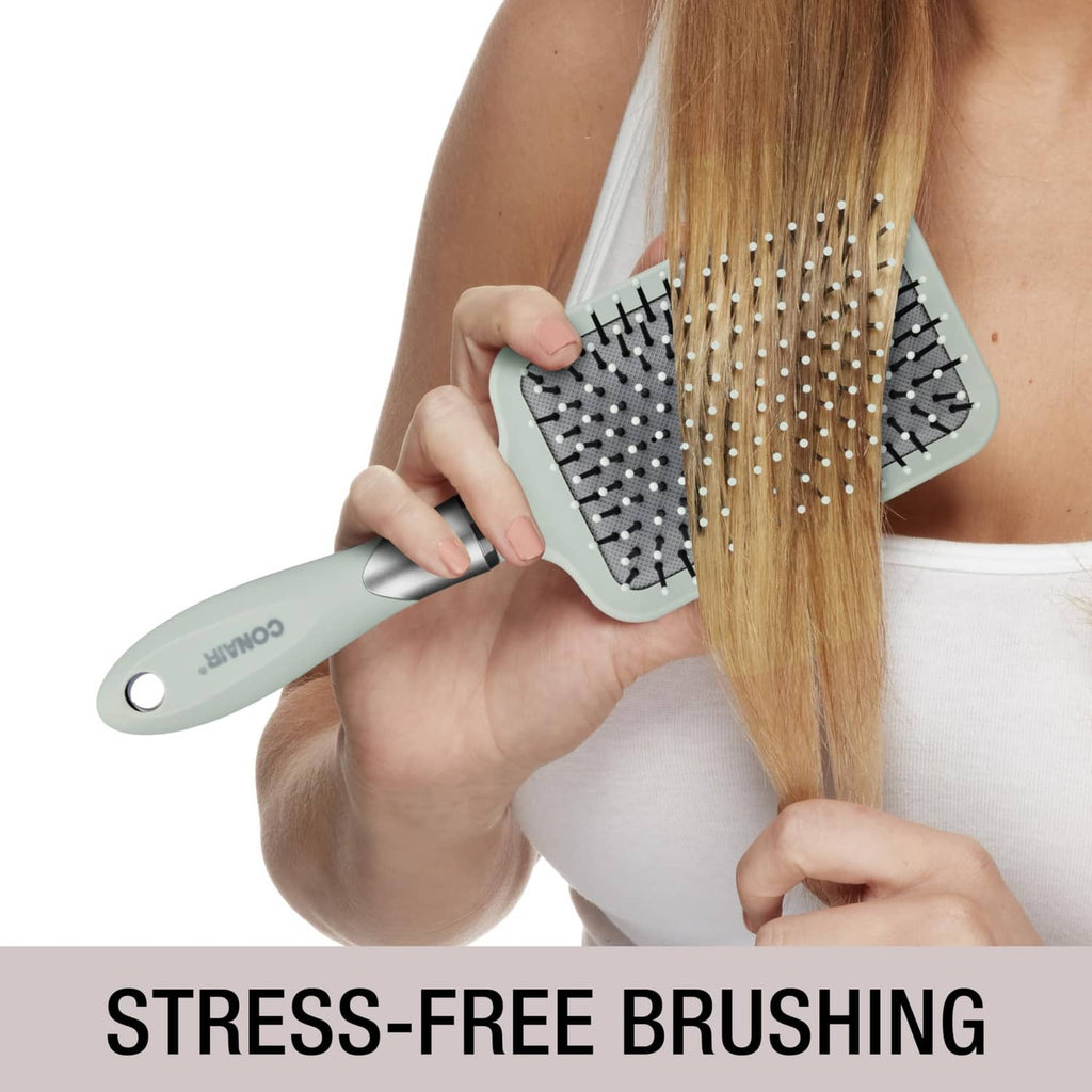 Conair velvet touch paddle brush brushing blonde hair, cushion pins on gray pad
