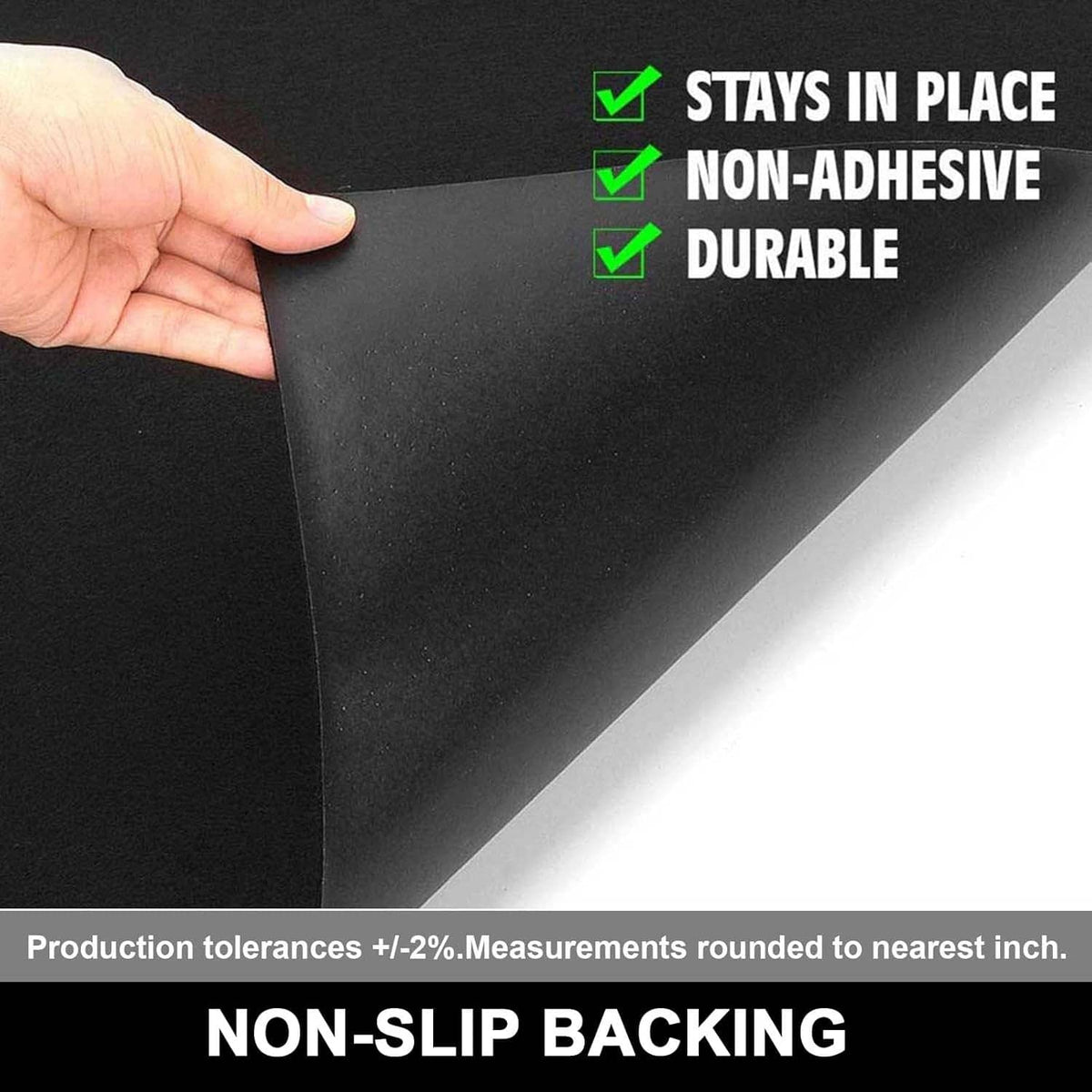 Black oil spill mat corner with hand, non-slip textured surface