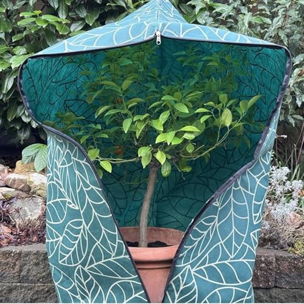 Green plant frost cover with white leaf pattern, front opening with zipper